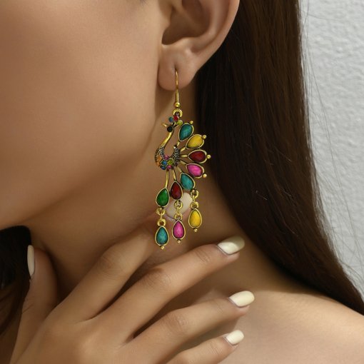 Creative retro Peacock ethnic style hollow earrings personality European and American earrings long tassel wholesale - 图片 3