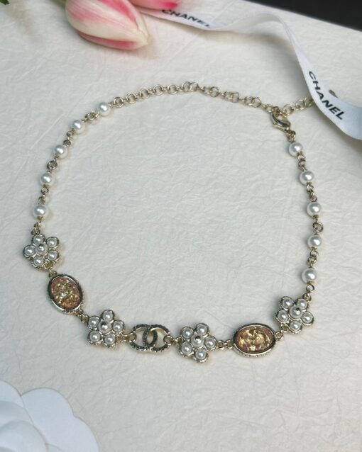 Chanel new oval amber orange petal double c necklace