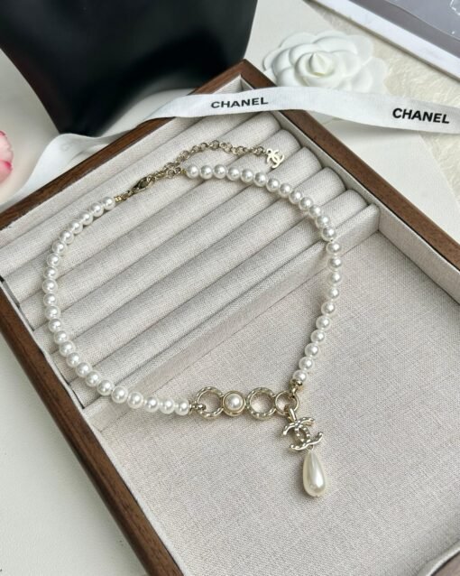 Chanel new coco pearl double c pendant necklace