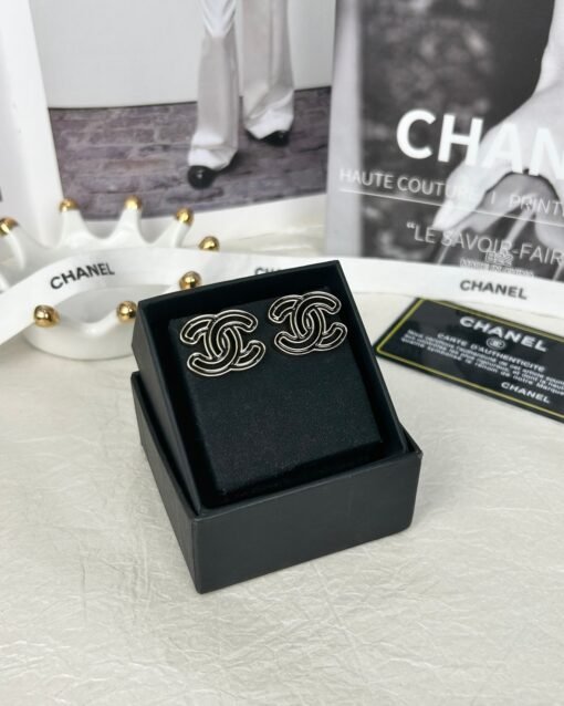 Chanel  double c hollow stud earrings, two colors available (black/white)