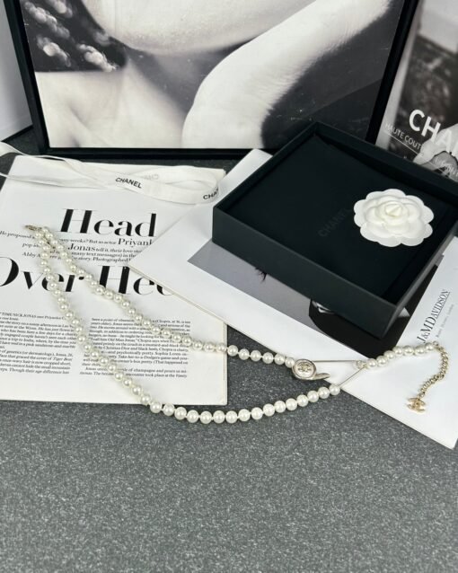 Chanel new style round button pin design double-layer pearl necklace
Sweater chain - Image 9