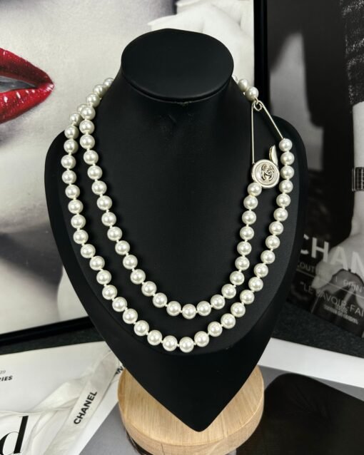 Chanel new style round button pin design double-layer pearl necklace
Sweater chain - Image 5