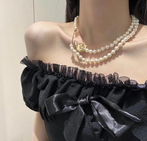 Chanel new style round button pin design double-layer pearl necklace
Sweater chain - Image 2