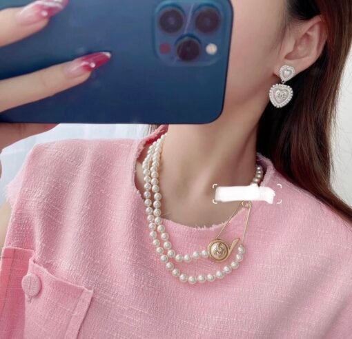 Chanel new style round button pin design double-layer pearl necklace
Sweater chain - Image 3
