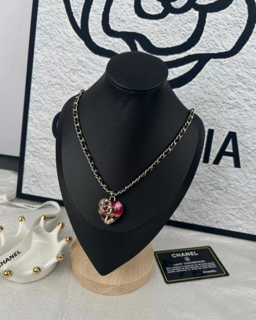 Chanel new amber element resin peach heart-wired leather necklace