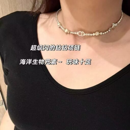 Chanel new gold and silver color-blocking shell pearl four-leaf clover small fish rhinestone double c necklace - Image 3
