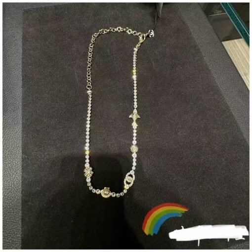 Chanel new gold and silver color-blocking shell pearl four-leaf clover small fish rhinestone double c necklace - Image 4