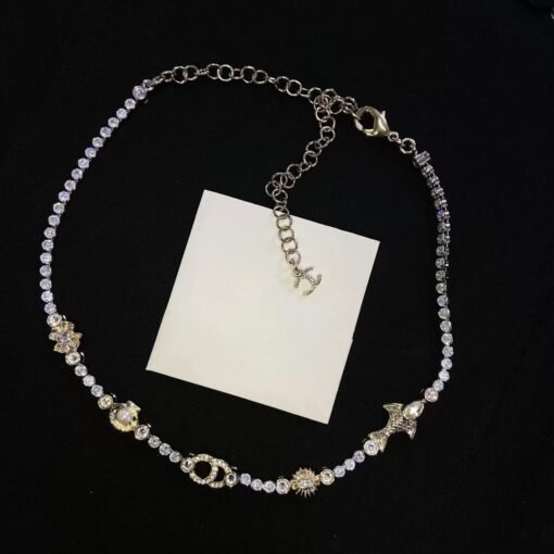 Chanel new gold and silver color-blocking shell pearl four-leaf clover small fish rhinestone double c necklace - Image 5