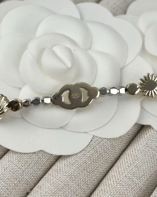 Chanel new gold and silver color-blocking shell pearl four-leaf clover small fish rhinestone double c necklace - Image 9