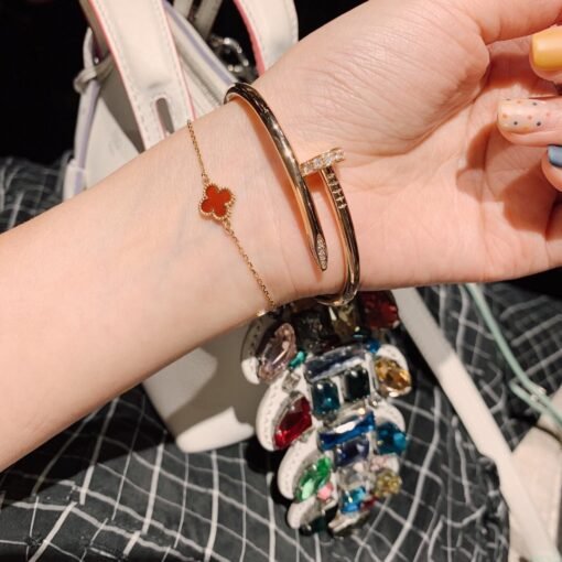 Four-leaf clover single flower bracelet, paired with a Cartier nail bracelet. - 图片 2