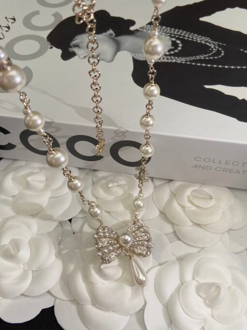 Necklace  earrings
@Chanel bow pearl set
The ultimate beauty Swarovski crystal diamond pearl
A must-have dinner - Image 2