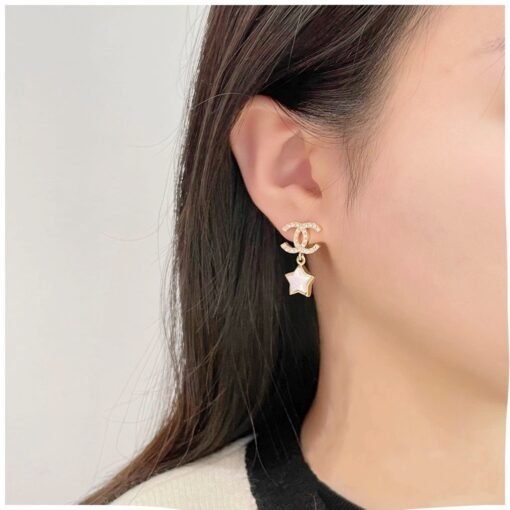 New ChanelNew products today
 24C new gold rhinestone double C star stud earrings

Fully three-dimensional small stars are decorated with full diamonds under double C
Cute and lively on the top - Image 6