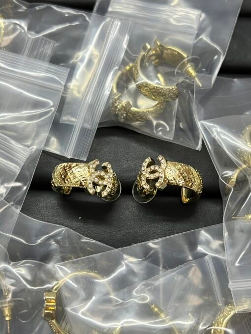 Chanel new golden letter double c earrings