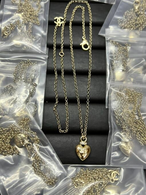 Chanel new love gold necklace