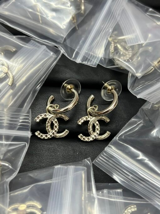 Chanel new diamond double c earrings