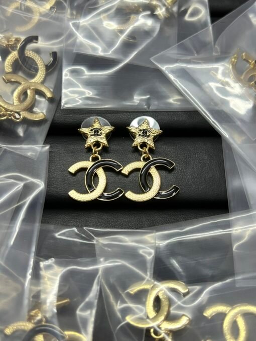 Chanel new five-pointed star double c black gold earrings