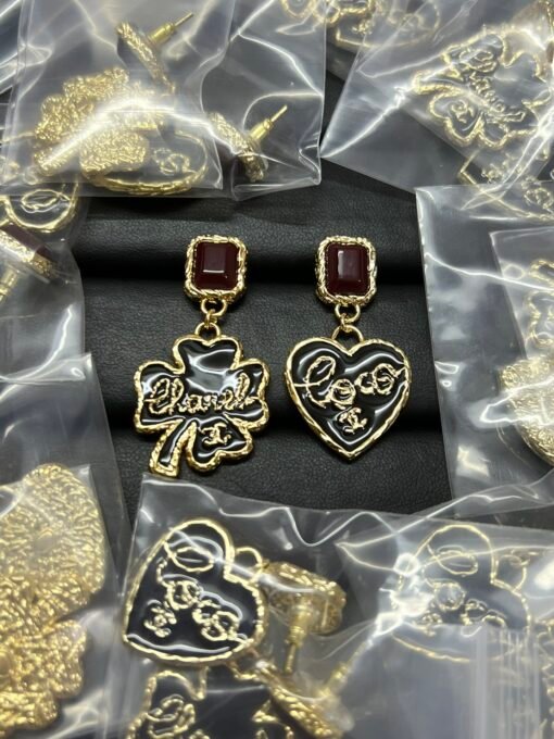 Chanel new four-leaf clover love letter asymmetric earrings