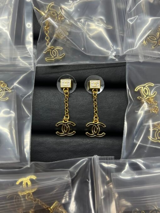 Chanel new double c drip oil black and white square tassel earrings