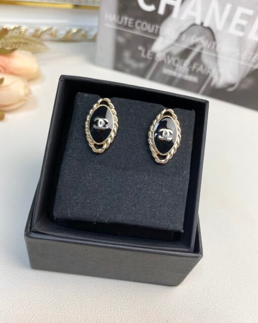 Chanel new style black enamel oval stud earrings