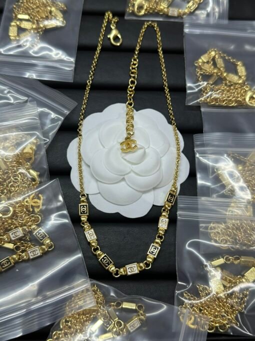Chanel new small square black and white splicing necklace