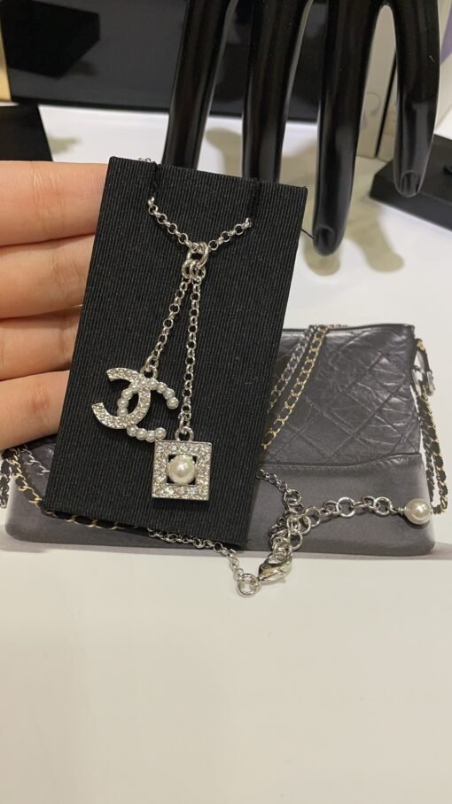Double pendant style arrived today
 24s new pearl rhinestone hollow square double C silver necklace