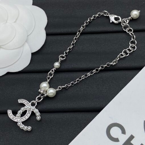 Bracelet necklace
ChChanel new suit - Image 5