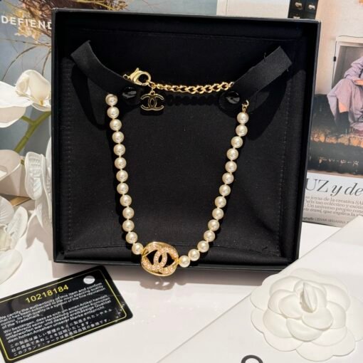 Chanel 24A Handicraftshop Series Jewelry New
Chanel White Beads LOGO Metal Short Chain
Square pearl necklace