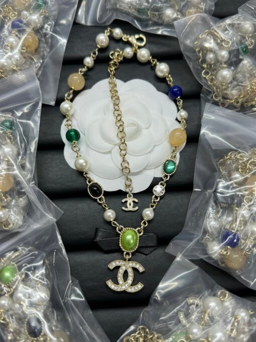 Chanel new black leather bow green pearl double c diamond color pearl necklace