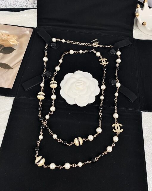 Chanel  new style ball resin black bead white bead necklace sweater chain
