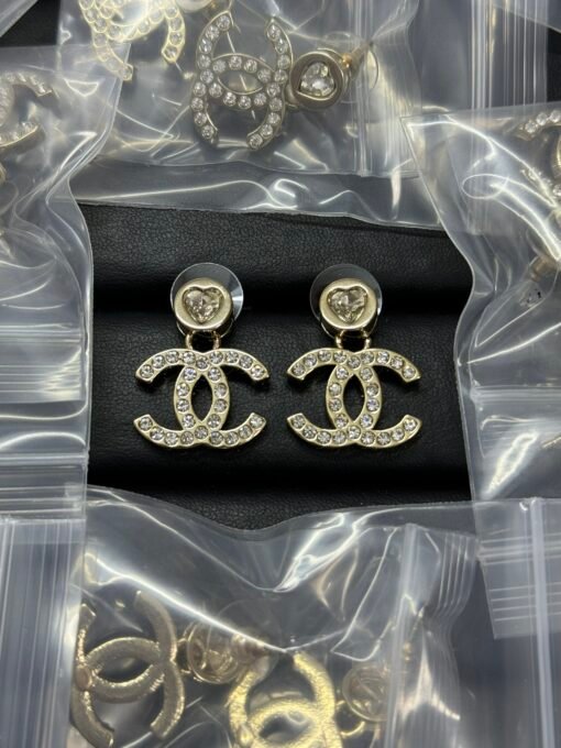 Chanel new round hollow love heart rhinestone double c earrings
