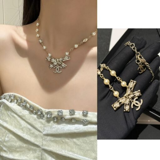 24 New jewelry
Light gold bow with diamond pearl necklace
Short-chain choker - Image 2