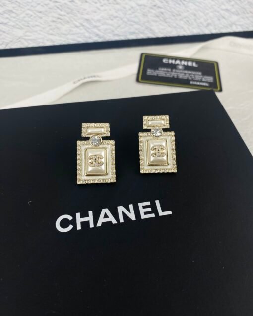 Chanel new resin oil-dripping rhinestones perfume bottle earrings