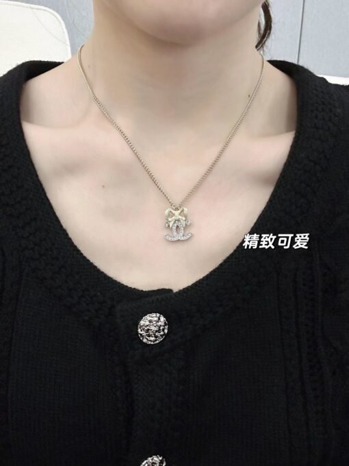 Chanel new light gold bow silver two-color full diamond necklace