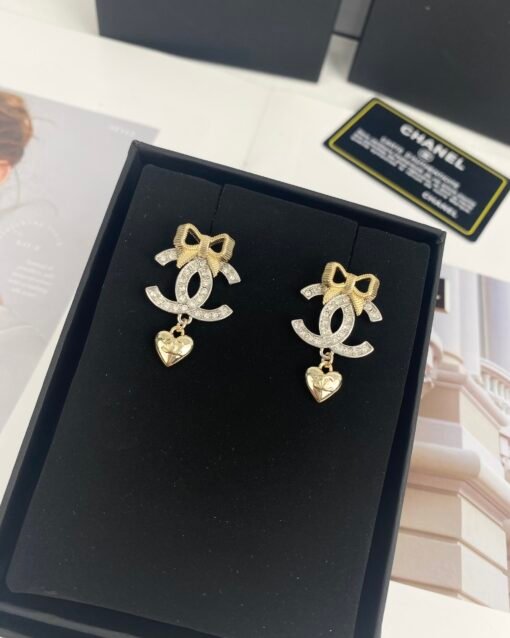 Chanel new style gold bow silver double c full diamond earrings