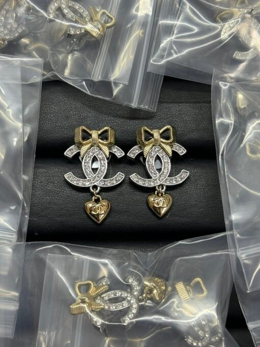 Chanel new color-blocking bow-pairing double c-heart earrings