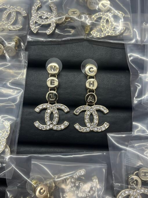 Chanel new hollow round letter splicing double C rhinestone earrings