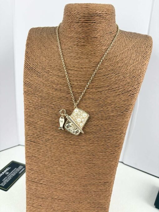 Necklace Brooch 
Chanel new golden square hanging small fish pearl necklace brooch - Image 9